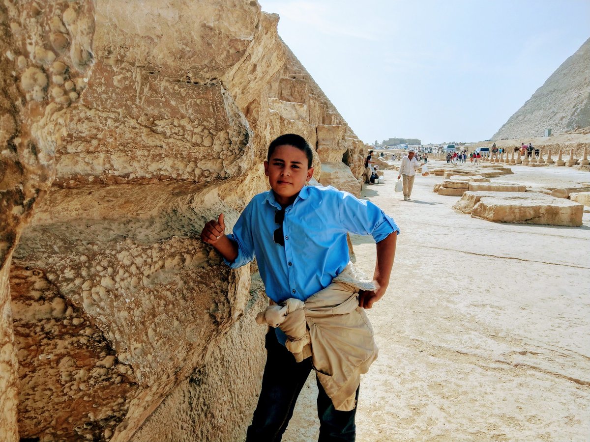 Standing at the Pyramids of Giza, Egypt