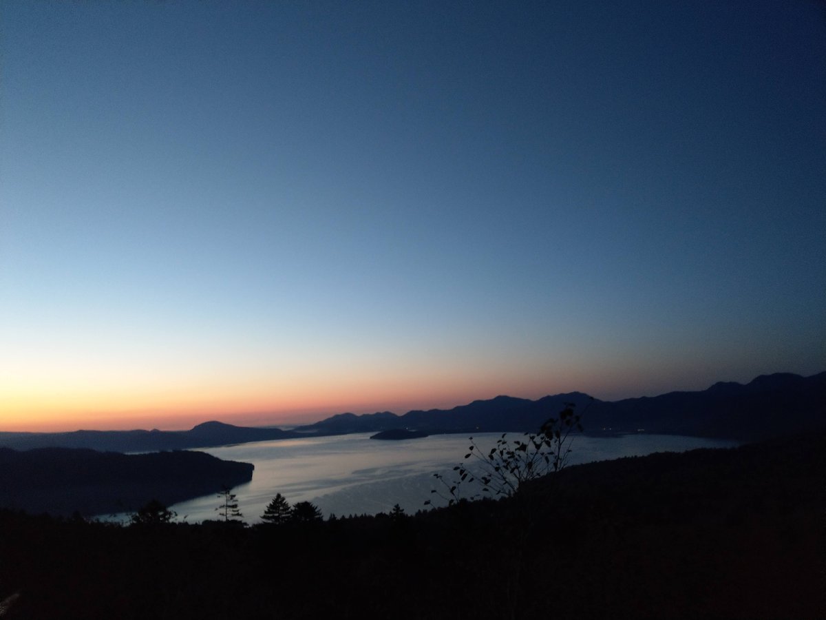 Hokkaido Autumn Sunrise Over Mountain Lake photo 2