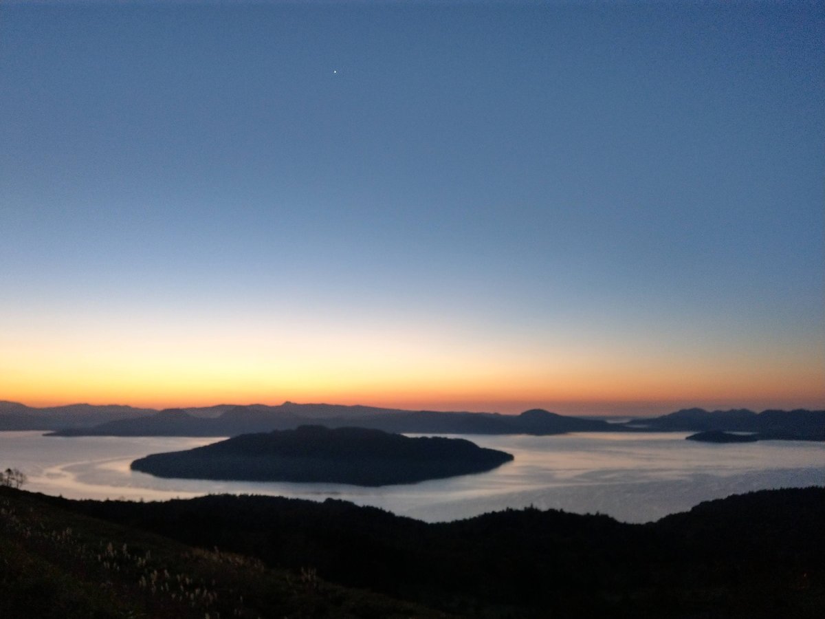 Hokkaido Autumn Sunrise Over Mountain Lake photo 3