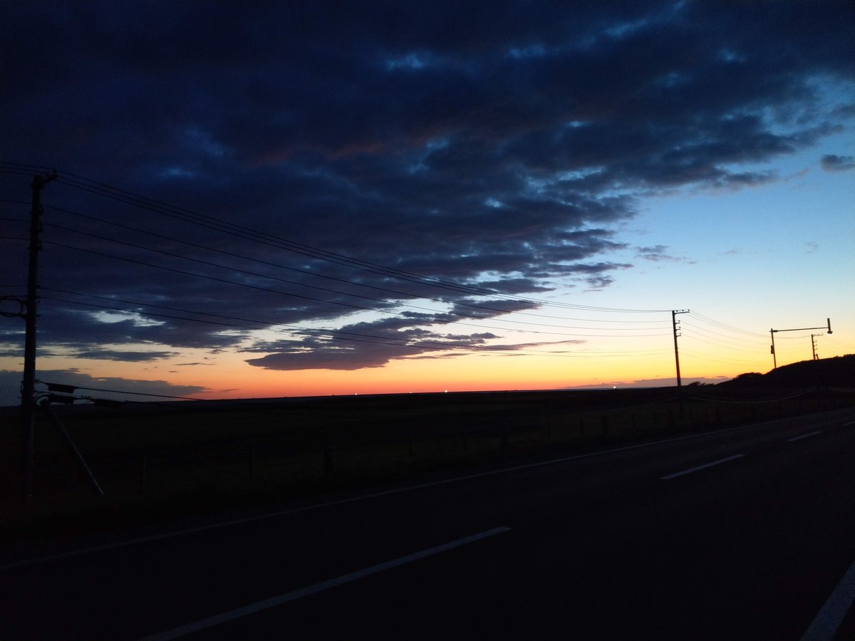 Endless Ocean View Across Hokkaido's Coastal Grassland photo 6